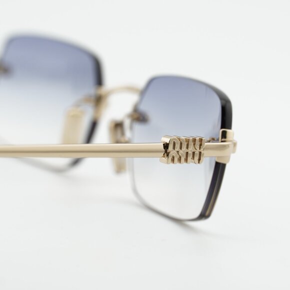Miu Miu MUB50S ZVN80O Sunglasses Gold Rectangle Frame, Light Blue Lenses